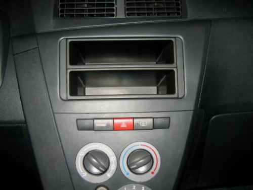 Conversion kit 1-Din radio bay for Cuore 2007